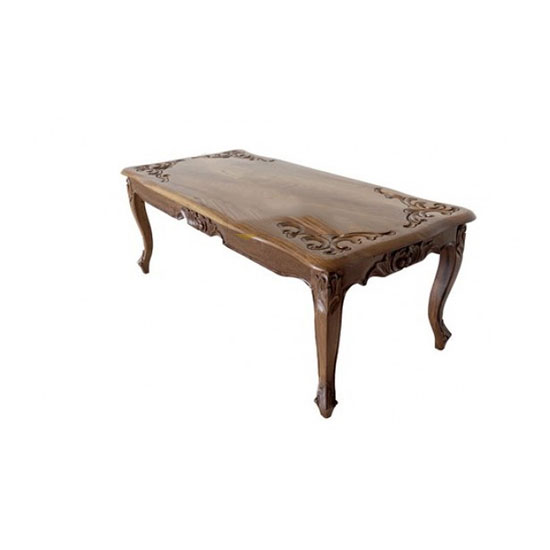 Antique style wooden carved table from Heritage Arts Kerala.